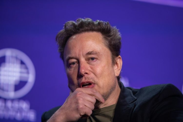 Elon Musk has revived a lawsuit against OpenAI and its co-founders Sam Altman and Greg Brockman. ©AFP