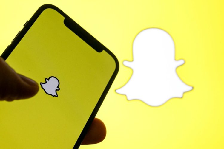 Snapchat parent Snap has yet to make a profit as it battles with Meta and Google for online ad revenue. ©AFP