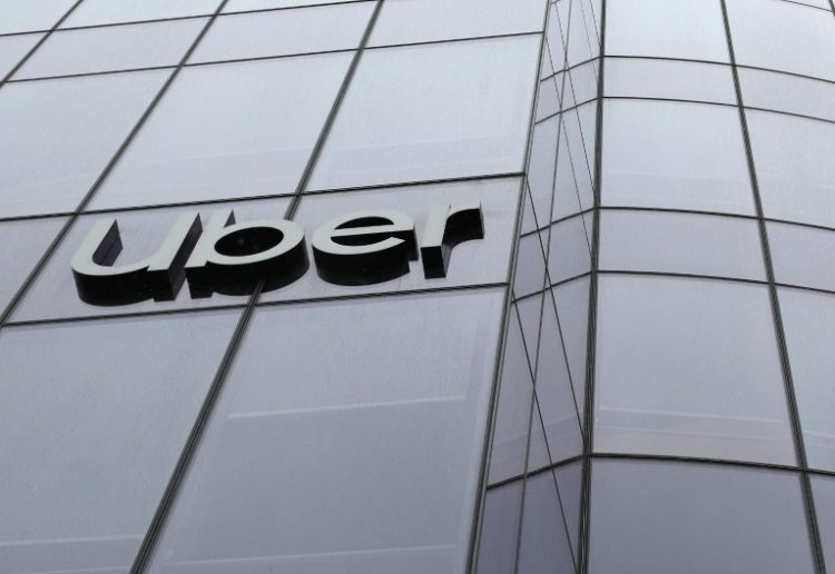 Uber was hit by the huge fine following a complaint from 170 French drivers. ©AFP