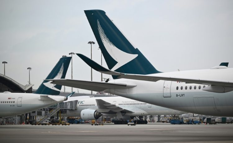 Hong Kong carrier Cathay Pacific said Wednesday it would buy at least 30 Airbus A330-900 aircraft in a deal valued at $11 billion . ©AFP