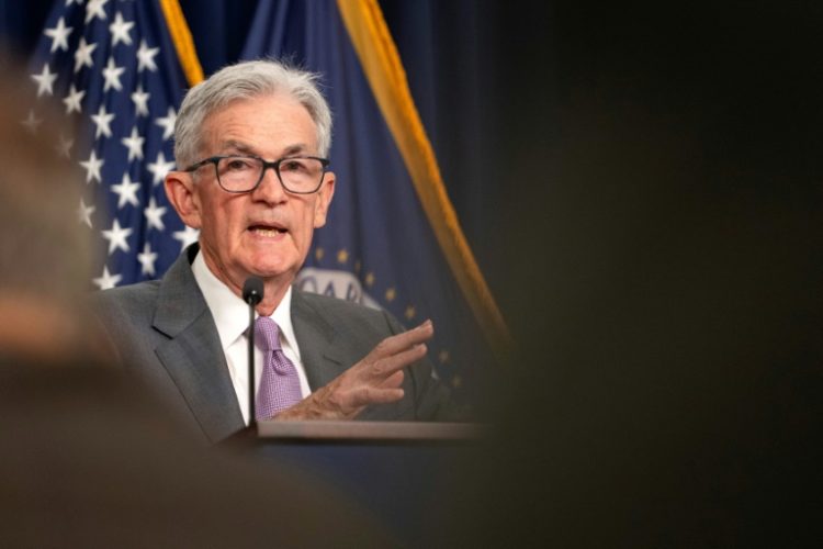 Some analysts have called for the Fed to make an emergency rate cut . ©AFP