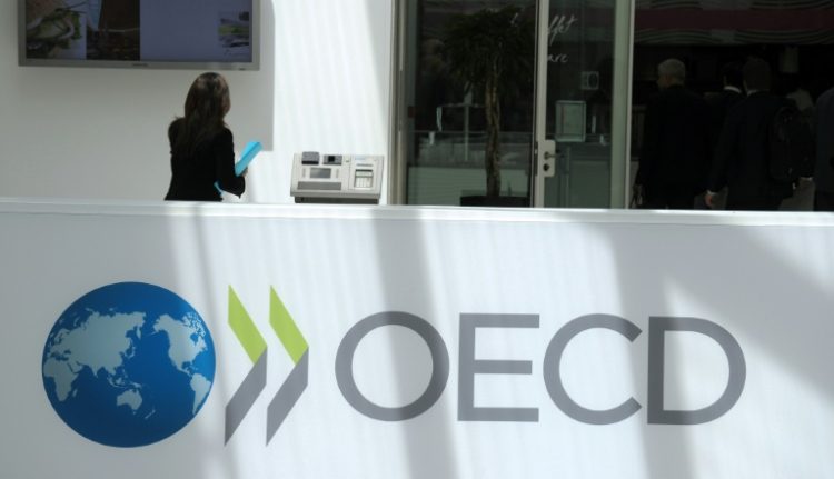 The OECD called for 'stronger efforts' to contain spending and raise revenue. ©AFP