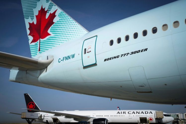 Air Canada said it was preparing to suspend most of its flights starting next Sunday. ©AFP