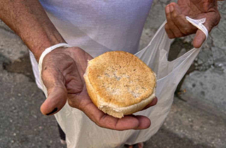 The government has reduced the weight of a daily subsidized bread portion from 80 to 60 grams (2.8 to 2.1 ounces) . ©AFP