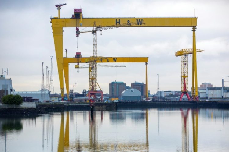 The Samson and Goliath cranes of the Harland & Wolff shipyard in the Belfast Harbour are a symbol of the city. ©AFP