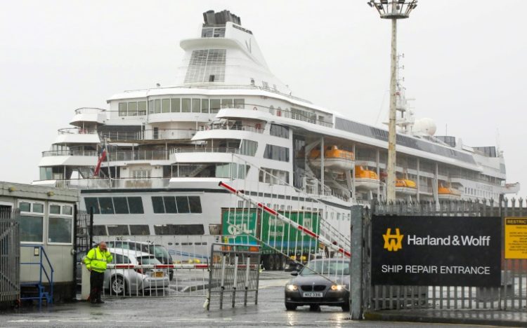 The 'Odyssey' cruise liner has been stuck in Belfast dock since May. ©AFP