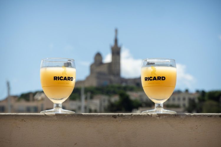 A glass of pastis is as much associated with Marseille as the port city's Notre Dame basilica. ©AFP