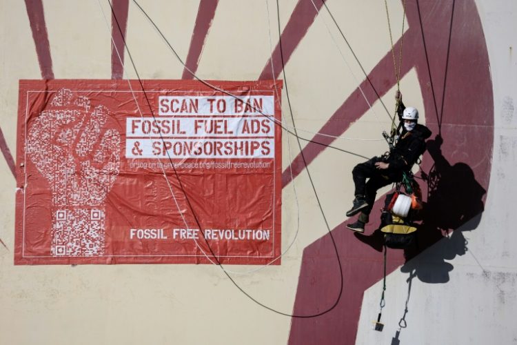 UN chief Antonio Guterres has urged every country to ban ads for fossil fuel companies. ©AFP