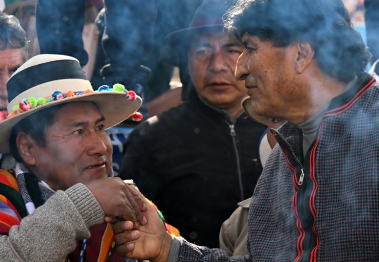 Evo Morales (R), Bolivia's first-ever Indigenous president from 2006-2019, was extremely popular until he tried to bypass the constitution and seek a fourth term. ©AFP