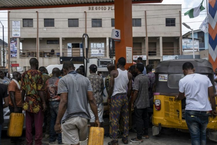 Nigerians grappled with widespread fuel scarcities and a hike in pump prices. ©AFP