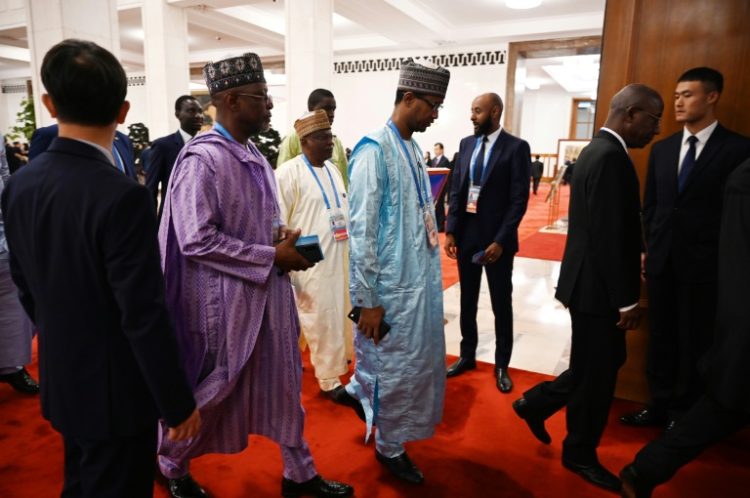 Delegates arrive for the opening ceremony of the Forum on China-Africa Cooperation in Beijing’s Great Hall of the People. ©AFP