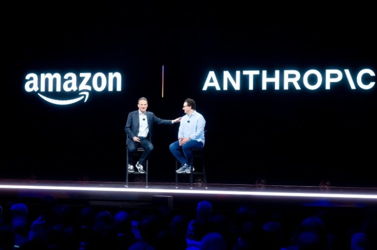 Anthropic co-founder Dario Amodei (R) shared the stage with then Amazon Web Services CEO Adam Selipsky (L) at an event in Las Vegas last year . ©AFP