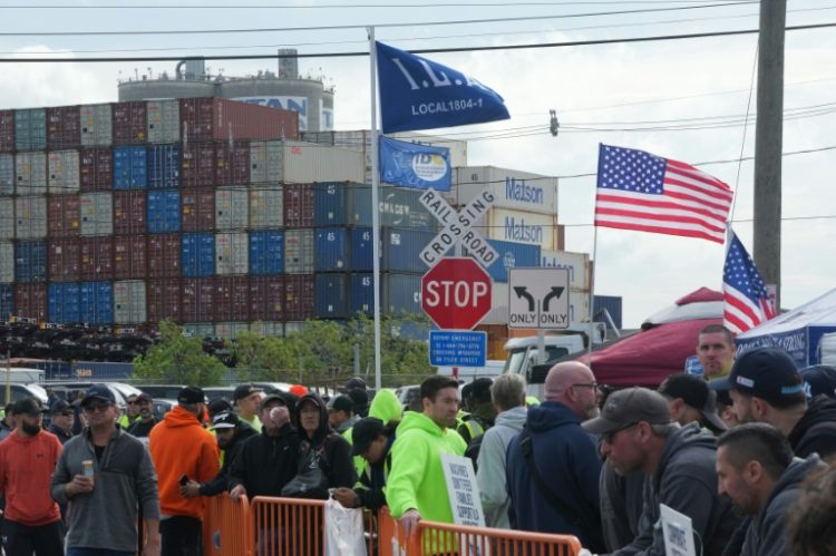 Shipping containers are stacked as dockworkers are on strike in Port Newark on October 1, 2024 in New Jersey. ©AFP