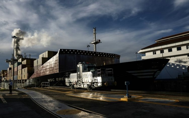 A cargo ship passes through the Miraflores locks on the Panama Canal in Panama City on October 7, 2024. ©AFP