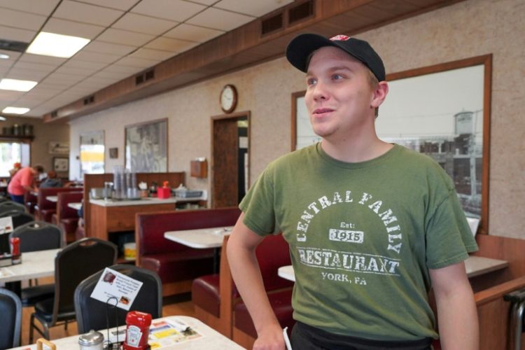 Zackree Kline, 21, works as a manager in a diner and also at a funeral home in York, Pennsylvania. ©AFP