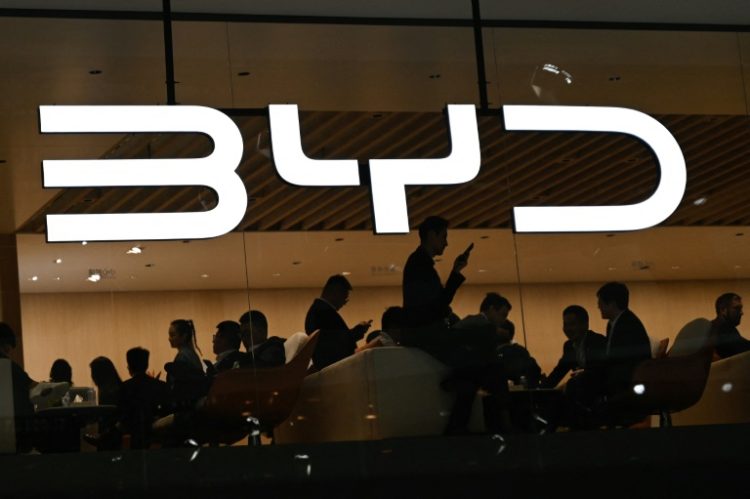 Chinese electric vehicle giant BYD reported surging sales on Wednesday, surpassing global rival Tesla in quarterly revenue for the first time. ©AFP