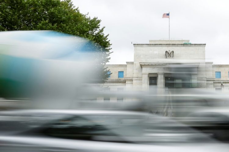 Disappointing US inflation data and a blockbuster jobs report have dented expectations for a second successive bumper interest rate cut by the Federal Reserve. ©AFP