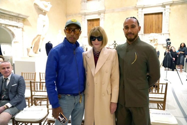 Pharrell Williams (L) and Formula One driver Lewis Hamilton (R), shown here with Anna Wintour, are among the co-sponsors of the 2025 Met Gala. ©AFP