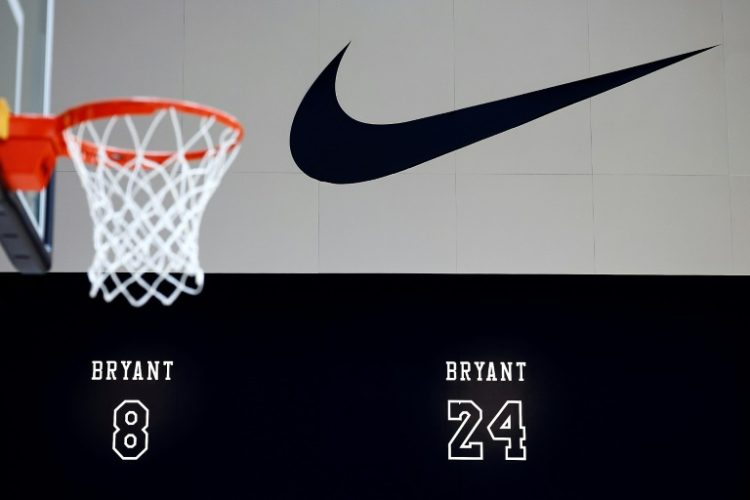 Nike shares fell as it signaled a turnaround from a rocky period would take time . ©AFP