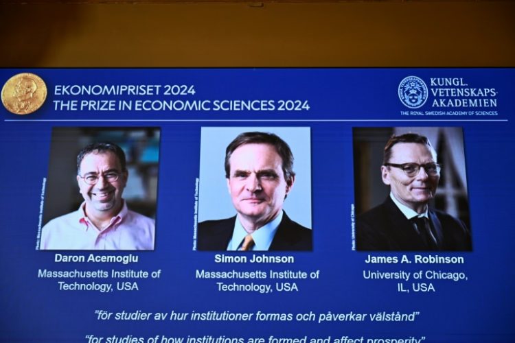 Daron Acemoglu, Simon Johnson and James Robinson demonstrated a relationship between societal institutions and prosperity, the Nobel economics jury said. ©AFP