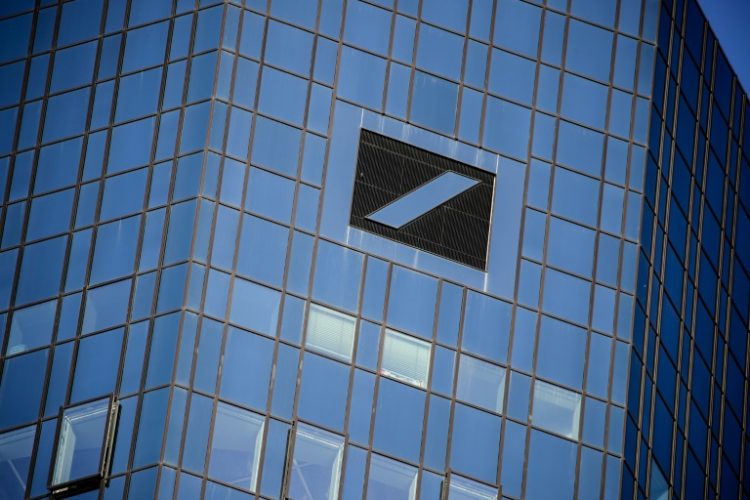 Deutsche Bank said it intends to resume share buybacks after posting better-than-expected third quarter results. ©AFP