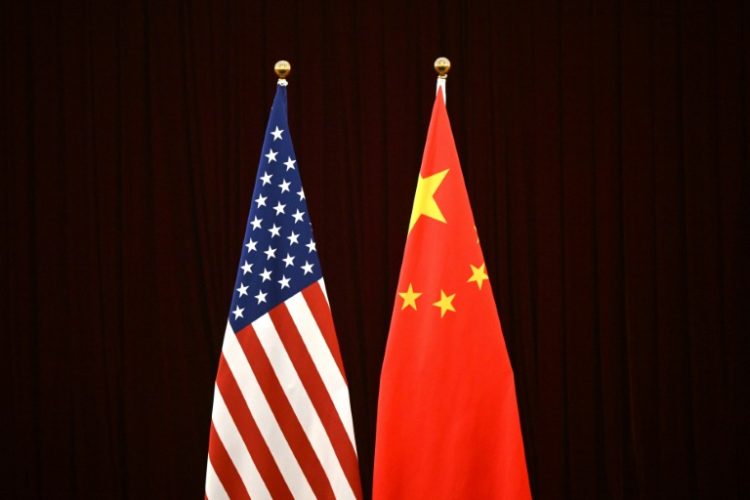 China's Commerce Minister Wang Wentao on Tuesday raised 'serious concerns' with his US counterpart Gina Raimondo on Washington's curbs on its trade. ©AFP