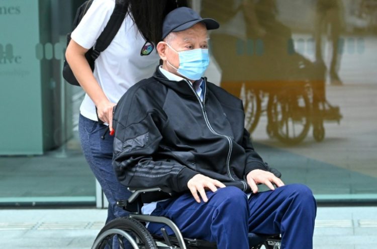 Former oil tycoon Lim Oon Kuin arrives to be sentenced at the State Court in Singapore. ©AFP