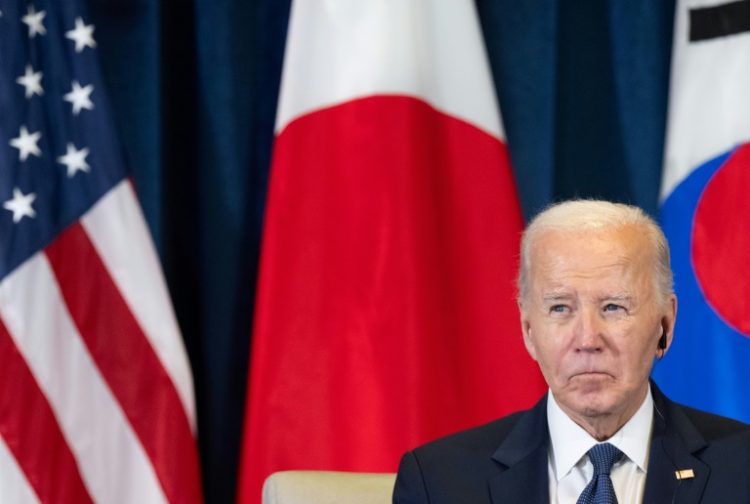 US President Joe Biden met Japanese Prime Minister Shigeru Ishiba and South Korean President Yoon Suk Yeol in Lima . ©AFP