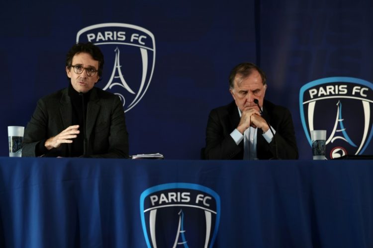 Antoine Arnault (L) and Paris FC president Pierre Ferracci (R) at Wednesday's press conference announcing the imminent acquisition of the club. ©AFP