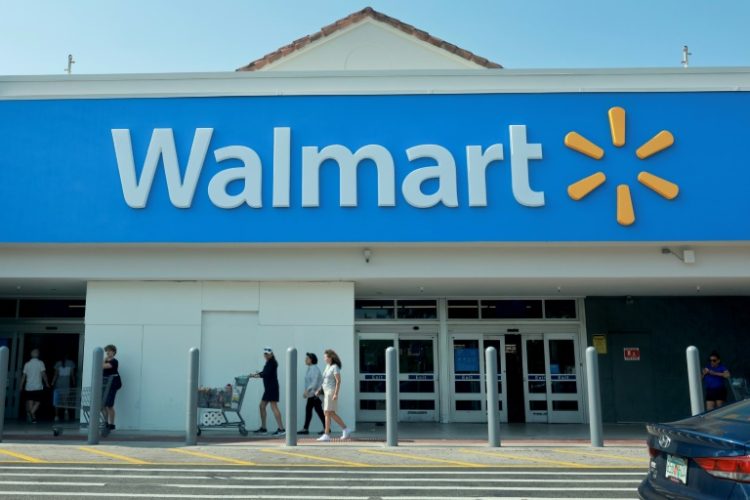 Shares of Walmart rose as it reported higher profits and lifted its forecast. ©AFP