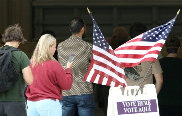 Investors are jockeying for position ahead of Tuesday's vote, with polls showing Kamala Harris and Donald Trump neck and neck nationally and in key states. ©AFP