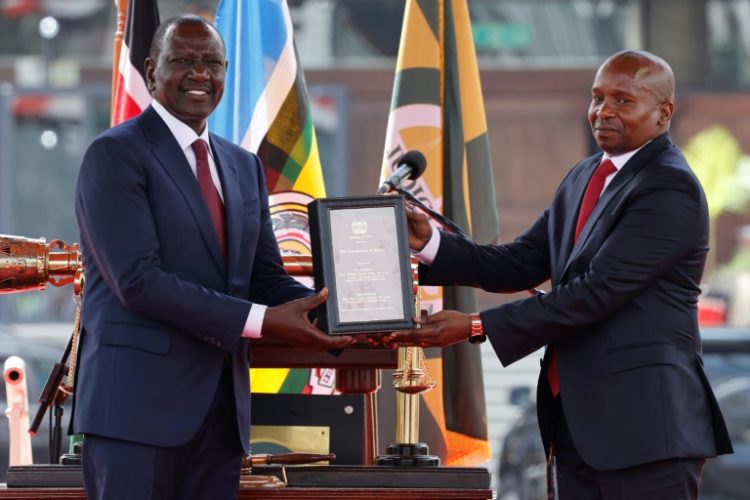 President William Ruto welcomed Kithure Kindiki as his new deputy president at a swearing-in ceremony . ©AFP