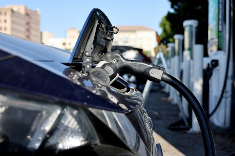 California Governor Gavin Newsom said the state will step in to plug the gap if Donald Trump removes federal tax breaks for electric vehicles. ©AFP