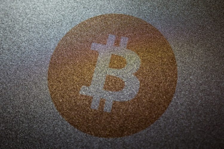 Bitcoin dipped below $90,000 level after striking a record of $93,462 on Wednesday. ©AFP