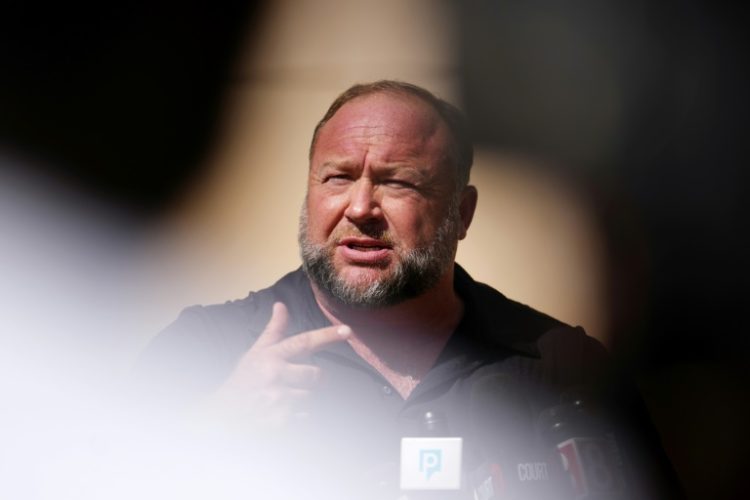 Infowars founder Alex Jones was sued for spreading false claims about a US school shooting -- which put his Infowars website in financial peril. ©AFP