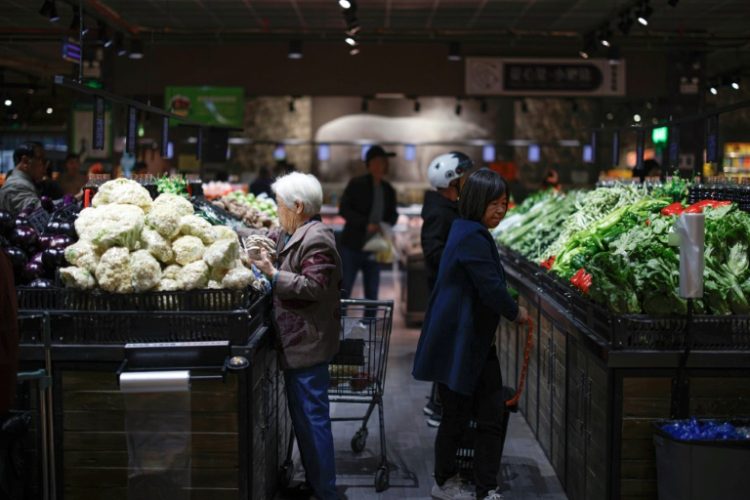 Chinese policymakers are grappling with  slumping domestic consumption. ©AFP