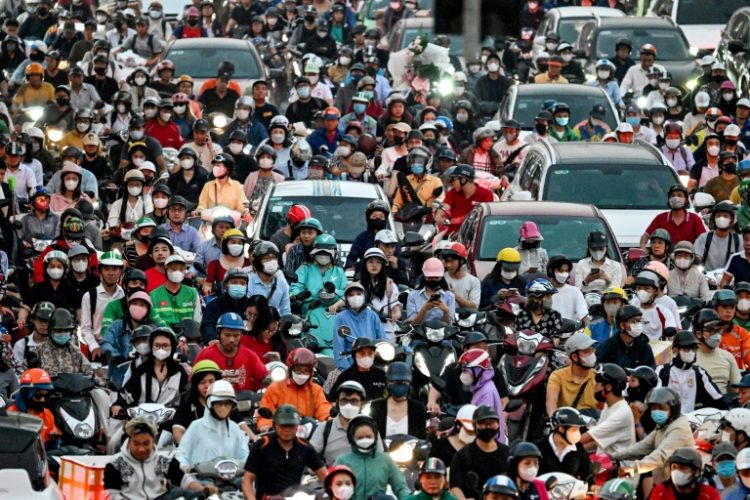 Hanoi authorities say  more than two thirds of the poisonous smog that blankets Vietnam's capital is caused by petrol vehicles, and officials have ordered that a quarter of two-wheelers across the country must be electric by 2030 . ©AFP