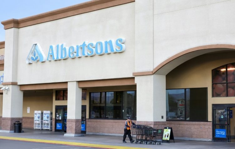 Albertsons announced it was terminating its proposed $25 billion deal with Kroger and suing its former partner for breach of contract . ©AFP