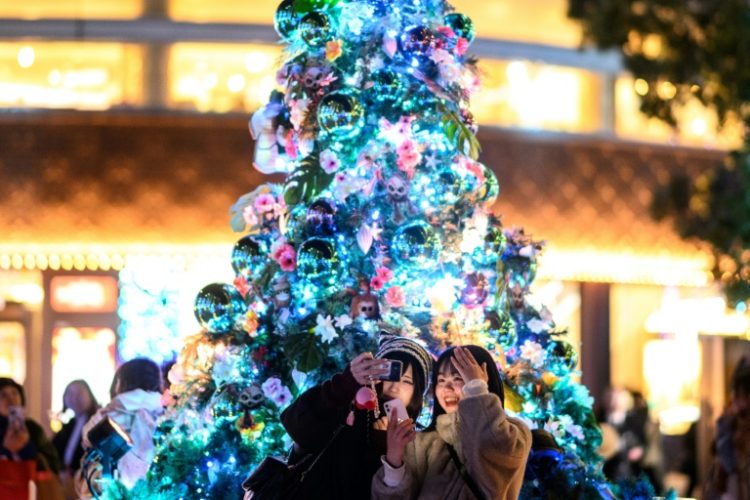 Asia's stocks rose in thin Boxing Day trade on Thursday, extending a "Santa Rally" with key markets Hong Kong and Sydney still shut for the holidays. ©AFP