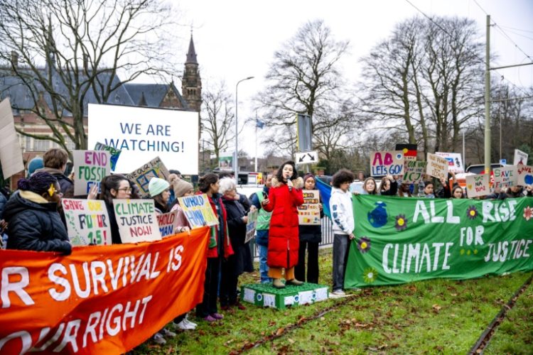 A handful of protesters gathered outside the Peace Palace. ©AFP