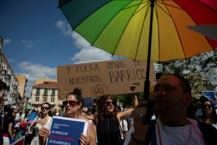 Mass tourism is a hot topic in Spain as foreign visitors drive the economy but fuel anger about unaffordable housing. ©AFP