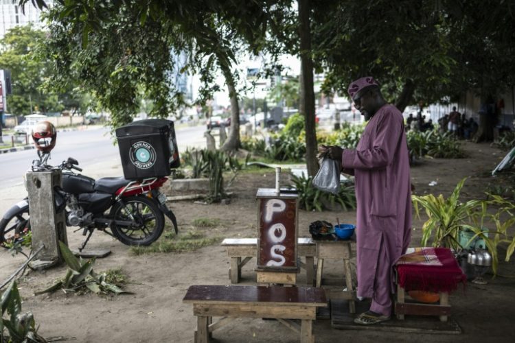 Mobile money agents have become a common sight in Nigeria. ©AFP