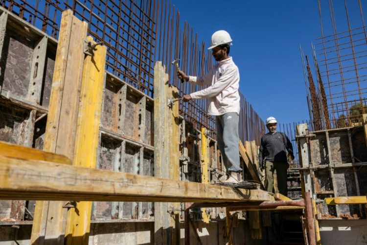 Indian construction workers are part of Israel's effort to fill a void left by Palestinians barred from entering Israel since the Hamas attack in October, 2023. ©AFP