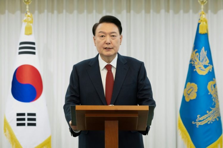 Seoul's Kospi swung after South Korean President Yoon Suk Yeol was impeached at the weekend for this month's short-lived martial law declaration . ©AFP