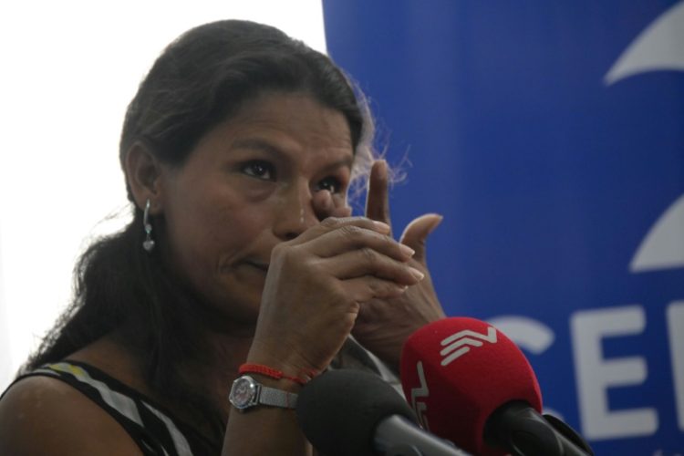 Maria Guerrero gave an emotional account of her experience on a Furukawa plantation. ©AFP