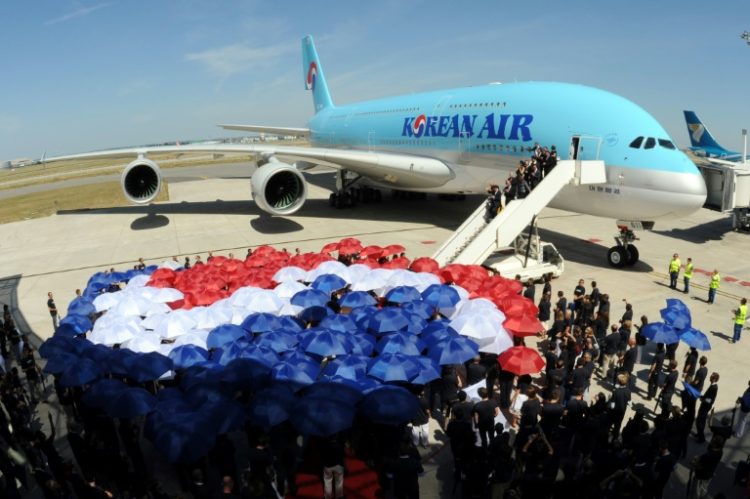 Korean Air said it paid $1 billion for the stake in rival Asiana . ©AFP