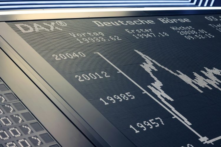 A board displays the chart of Germany's share index DAX in Frankfurt am Main, which jumped above 20,000 points for the first time . ©AFP