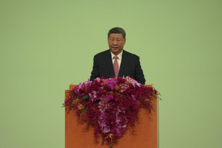 Xi made the remarks after a slow economic year for China. ©AFP