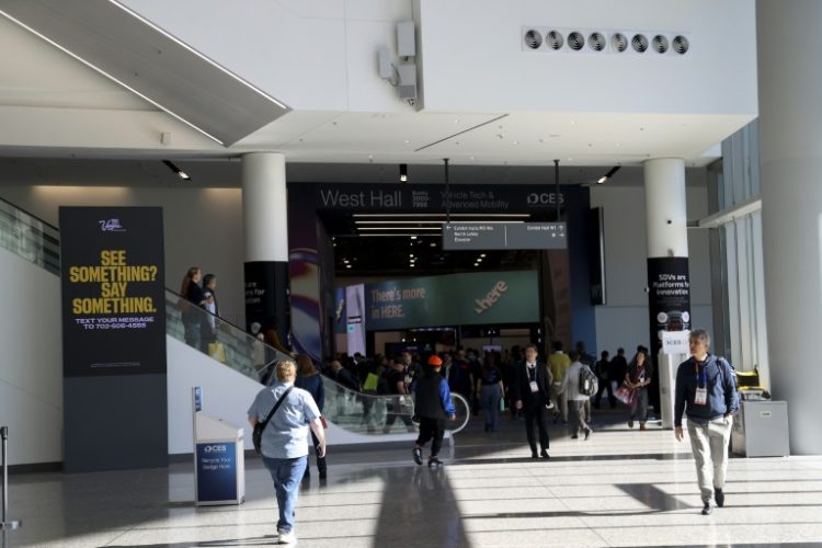 Attendees walk through the main entrance during the Consumer Electronics Show in Las Vegas on January 10, 2025. ©AFP