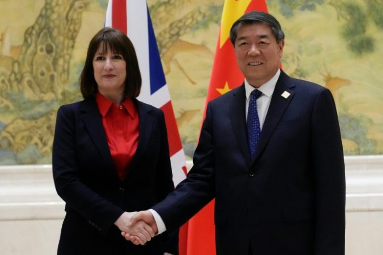 Finance minister Rachel Reeves (L, with Chinese Vice Premier He Lifeng) is the most senior British government official to visit China in seven years. ©AFP